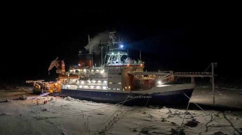 Image shows the German research icebreaker Polarstern moored to an ice floe during the polar night. CREDIT: Steffen Graupner / Alfred Wegener Institute