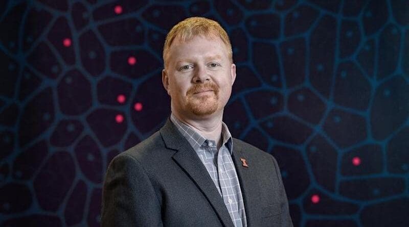 Andrew Leakey and his colleagues developed an AI tool that uses minimal training to teach itself to distinguish the flowers of thousands of varieties of Miscanthus, a plant used in biofuels production. CREDIT: Photo by Craig Pessman