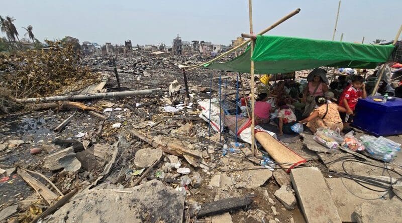 People sleep under a makeshift shelter in Sein Pan district in Mandalay’s Maha Aung Myay Township, where the March 28 quake destroyed more than 400 homes on April 4 (Credit: Zaw Zaw | Frontier).