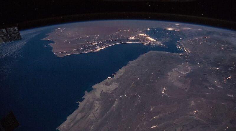 Gulf of Oman with Strait of Hormuz at night. Photo Credit: NASA Earth Observatory, Wikimedia Commons