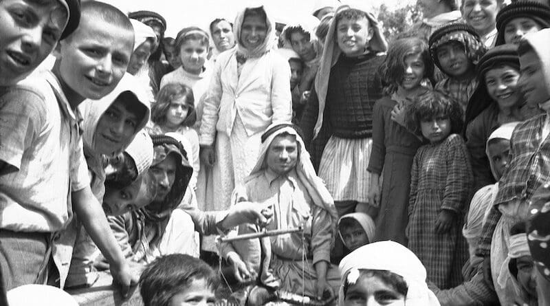 Alawites celebrating a festival in Banyas, Syria during World War II. Photo Credit: Frank Hurley, Wikimedia Commons