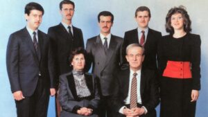 The Assad family. Hafez al-Assad and his wife, Mrs Anisa Makhlouf. On the back row, from left to right: Maher, Bashar, Basil, Majid, and Bushra al-Assad before 1984. Photo Credit: Unknown author, Wikimedia Commons