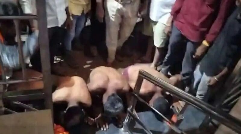 The picture shows a crowd of Hindus forcing three Christians to bow down before a temple deity to show their respect in a village in central Indian Madhya Pradesh state on the night of June 22. Viral videos also show that, before this, the Christians were also attacked and paraded naked through the streets. (Photo; Screenshot from video)