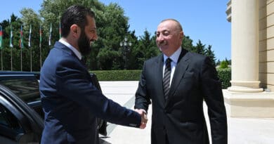 Azerbaijan's President Ilham Aliyev (right) with Syria's interim President Ahmed al-Sharaa. Photo Credit: President.az, X