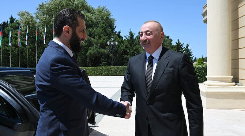 Azerbaijan's President Ilham Aliyev (right) with Syria's interim President Ahmed al-Sharaa. Photo Credit: President.az, X