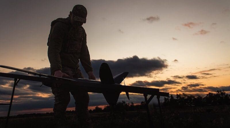 A Ukrainian soldier prepares to launch a drone. Photo Credit: Ukraine Defense Ministry