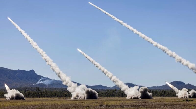 High Mobility Artillery Rocket Systems from the Australian army, the U.S. Army and the Singapore army fire multiple rockets during a combined joint live-fire exercise in Queensland, Australia, July 14, 2025. Photo Credit: Australian Cpl. Michael Rogers, Courtesy Australian Defense Force