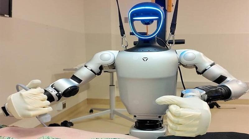 Surgie, a humanoid medical robot, is about to give an ultrasound to a patient. CREDIT: David Baillot/University of California San Diego
