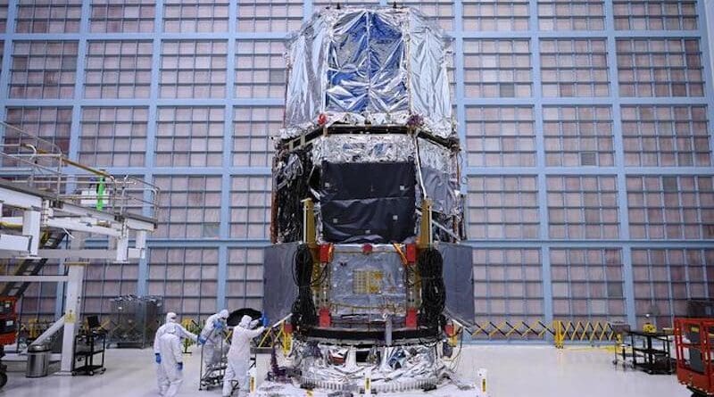 Technicians manually deploy the Lower Instrument Sun Shield for NASA's Nancy Grace Roman Space Telescope. The test helps verify the panels will operate as designed in space. CREDIT: NASA/Sophia Roberts