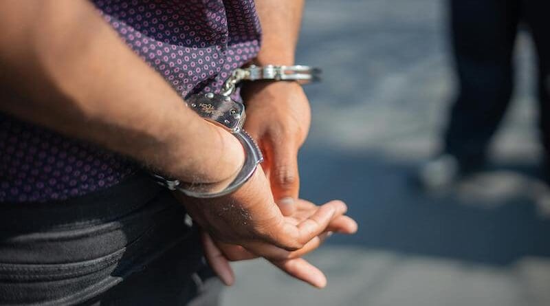 handcuffs arrest detain