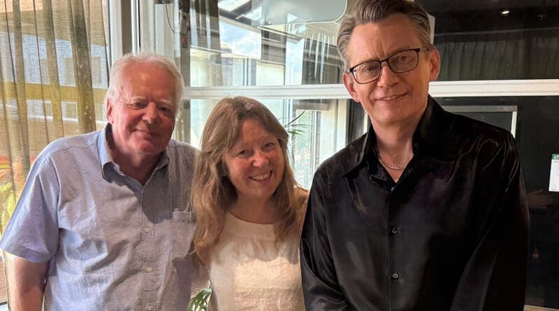 Jonas Anderson (in black) with his parents, July 18, 2025.  Photo by Ng Weng Hoong