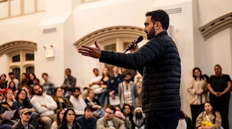 Zohran Mamdani speaks during an event at the Church of the Village in New York City. Photo Credit: Bingjiefu He, Wikimedia Commons, Cropped from Original