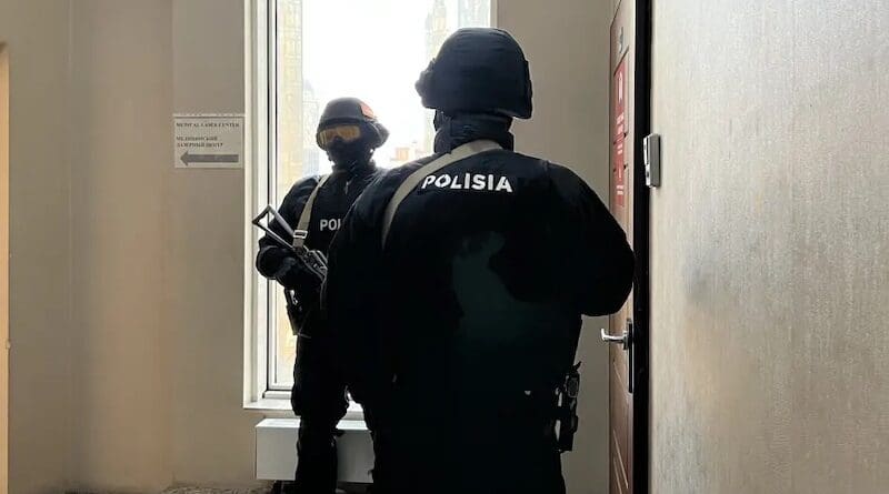 Special police force officers stand outside the Orda.kz editorial office in Almaty, Kazakhstan, during a December 1, 2025 search of the premises after authorities opened a criminal case against Gulnara Bazhkenova, the publication's editor-in-chief, for allegedly “disseminating knowingly false information." Photo Credit: © 2025 Meiirim Bakytzhanqyzy (RFE/RL)