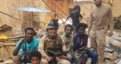 Undated photo of Colombian mercenaries posing with young members of the paramilitary Rapid Support Forces (RSF) in Sudan. Photo Credit: Social Media