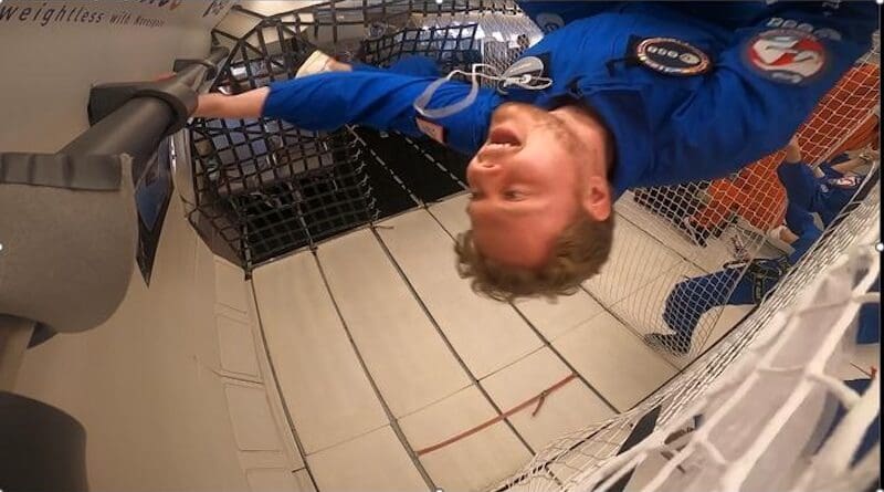 PhD student, Tom Wareing, floating in zero gravity during a parabolic flight. CREDIT: Image Courtesy of Adam Wollman