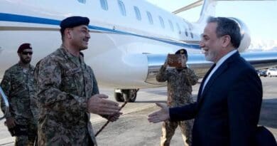 Pakistan's Army Chief Field Marshal Asim Munir is greeted by Iranian Foreign Minister Abbas Araghchi upon his arrival in Tehran on Wednesday. (Iranian state media)