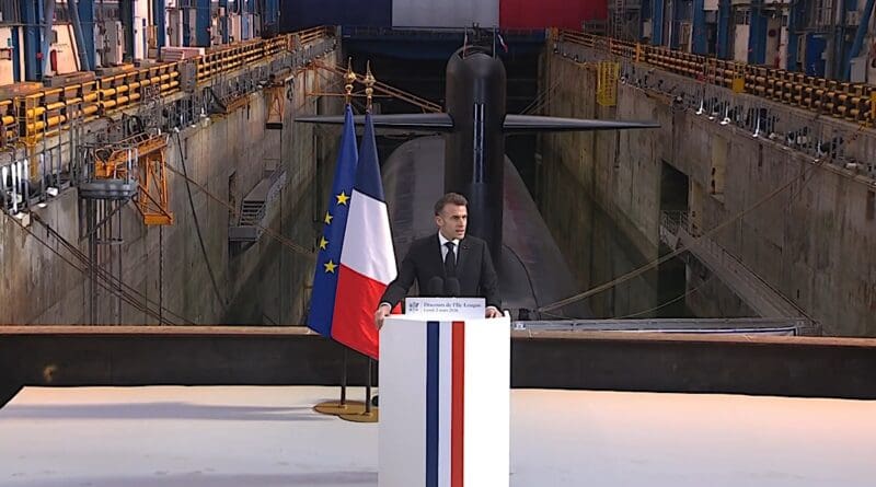 France's President Emmanuel Macron during his speech on March 2, 2026 at Ile Longue with the French Navy nuclear-powered ballistic missile submarine Le Temeraire in the background. Photo Credit: Screenshot French presidency video