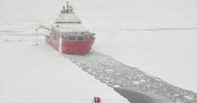 The Coast Guard cutter Storis sits in the icy water while deploying the cutter's ice rescue team to conduct training in the Arctic waters of the Bering Sea, April 16, 2026. Photo Credit: DOW