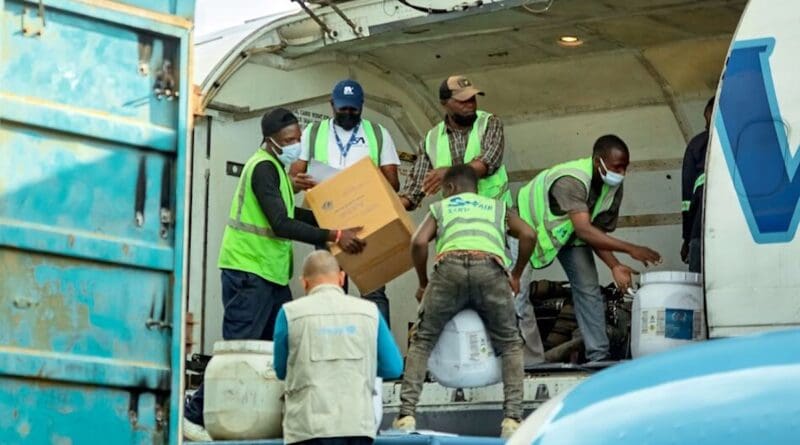 Workers unload supplies from a cargo plane at Bunia airport as part of the Ebola response in DR Congo. Photo Credit: UNICEF /Prince Shamwami