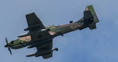 A Nigerian Air Force A-29 Super Tucano fires machine guns during an air drill. SENIOR AIRMAN REBECKAH MEDEIROS/U.S. AIR FORCE