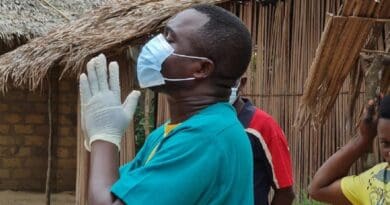 A health worker in Motema Pembe area prepares for a household decontamination in Mbandaka, Democratic Republic of the Congo. Photo Credit: WHO