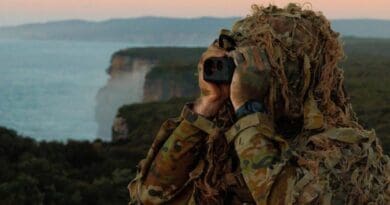 An Australian Army Soldier uses a laser range finder to target simulated enemy locations during Exercise Kakadu 2026 at the Beecroft Weapons Range in Jervis Bay, New South Wales. AUSTRALIAN DEFENCE DEPARTMENT