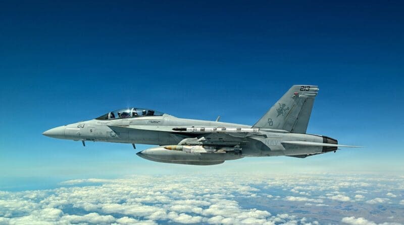 A U.S. Navy F/A-18 carries the new Joint Direct Attack Munition Long Range variant during an April 2026 test flight off California. U.S. NAVY