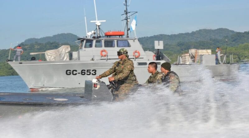 File photo. Members of Panama’s National Air and Naval Service (SENAN) aboard a small boat pass the Guatemalan patrol craft Azumanche as it goes out to sea to take part in PANAMAX 2011, Panama City. (Photo: U.S. Navy Petty Officer First Class Jose Lopez)