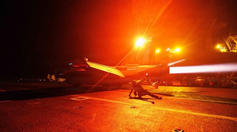 U.S. sailors conduct nighttime flight operations aboard USS George H.W. Bush (CVN 77) while transiting the Arabian Sea. Photo Credit: CENTCOM, X