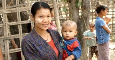 File photo of Myanmar Chin women and children. Photo Credit: DANIEL JULIE, Wikipedia Commons