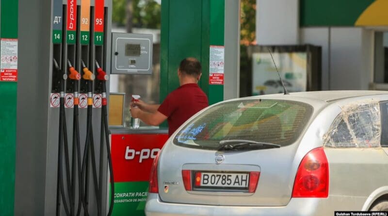 A man stands at a gas station in the Kyrgyz capital, Bishkek. (RFE/RL file photo)